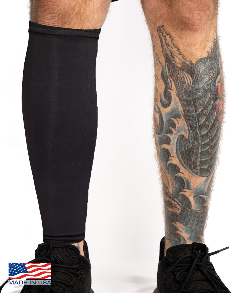 black tattoo cover up calf